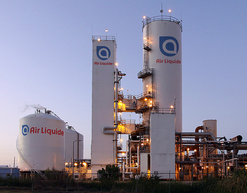Air Liquide plant with storage tanks at dusk